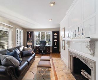 A cozy room with a fireplace in a home in Wellesley Township offered by Debi Benoit PHOTO: BY REMARK VISIONS