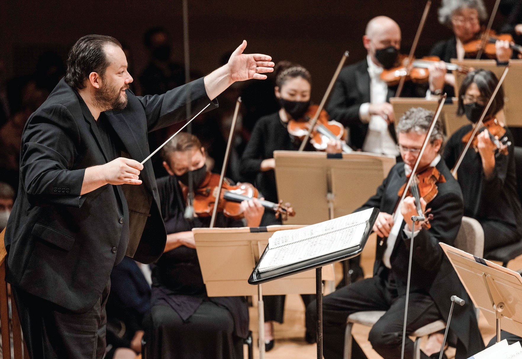 Watch as Latvian conductor Andris Nelsons leads the orchestra in “Scherben der Stille.” PHOTO BY ARAM BOGHOSIAN