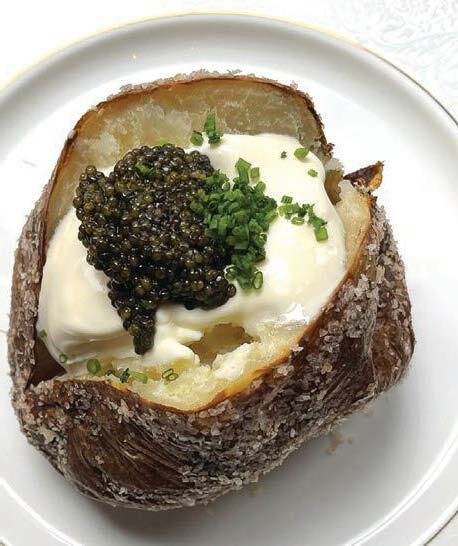 The infamous Million Dollar Potato from Abe &
Louie’s is the perfect side dish. PHOTO: COURTESY OF BRAND