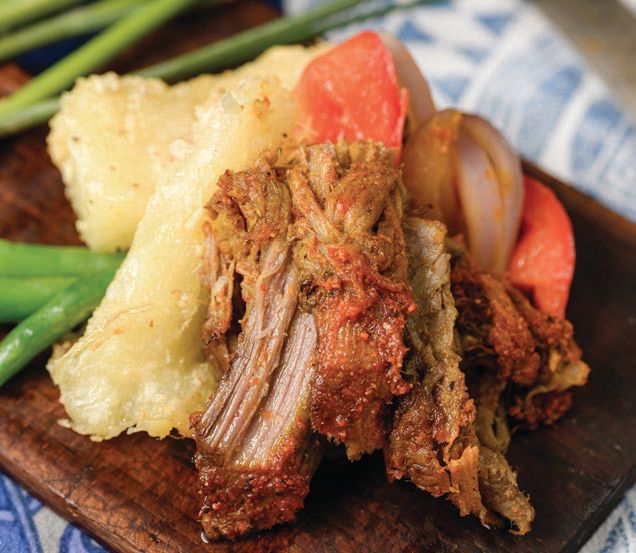 Try Azuluna Foods’ roast pernil pork this summer, made with mouthwatering seasonal ingredients. PHOTO: COURTESY OF AZULUNA FOODS